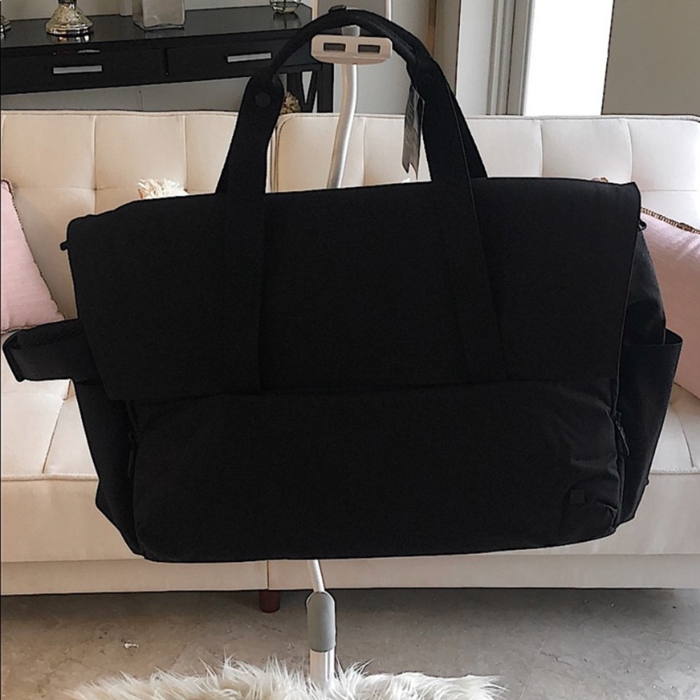 Brand new Lululemon Early Embark Duffel. Perfect for travel wherever you may go!